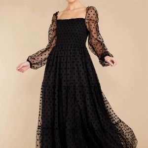 Black polka dot dress with beautiful detailing around shoulders & sheer sleeves.